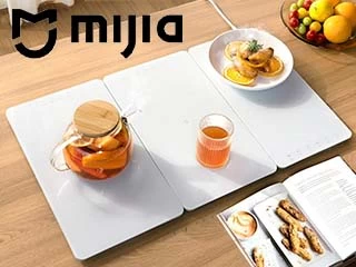 Разогреет ни на шутку! Xiaomi представила доску для подогрева еды и напитков