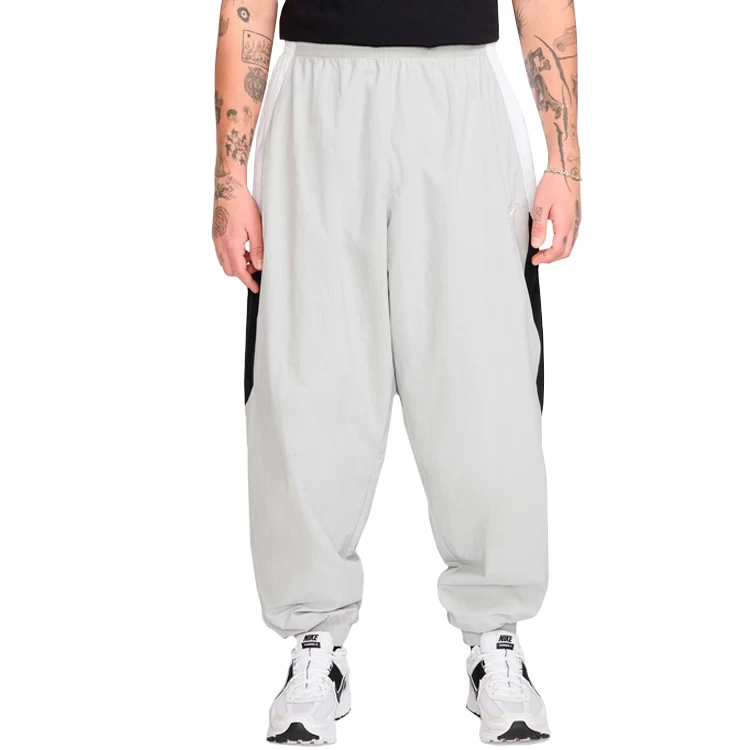 Pantaloni Nike M NK CLUB WVN TRK PANT OS M Gri Barbati photo 5